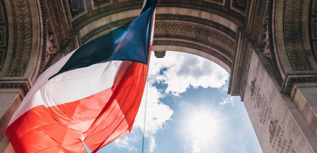French flag and monument